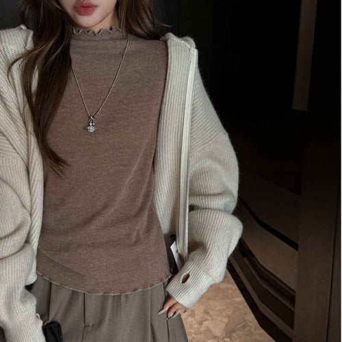 A Mock-neck Top Can Be Worn As An Outer Layer
